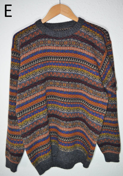 Handmade alpaca sweater with multicolor horizontal stripes and ribbed cuffs and hem.