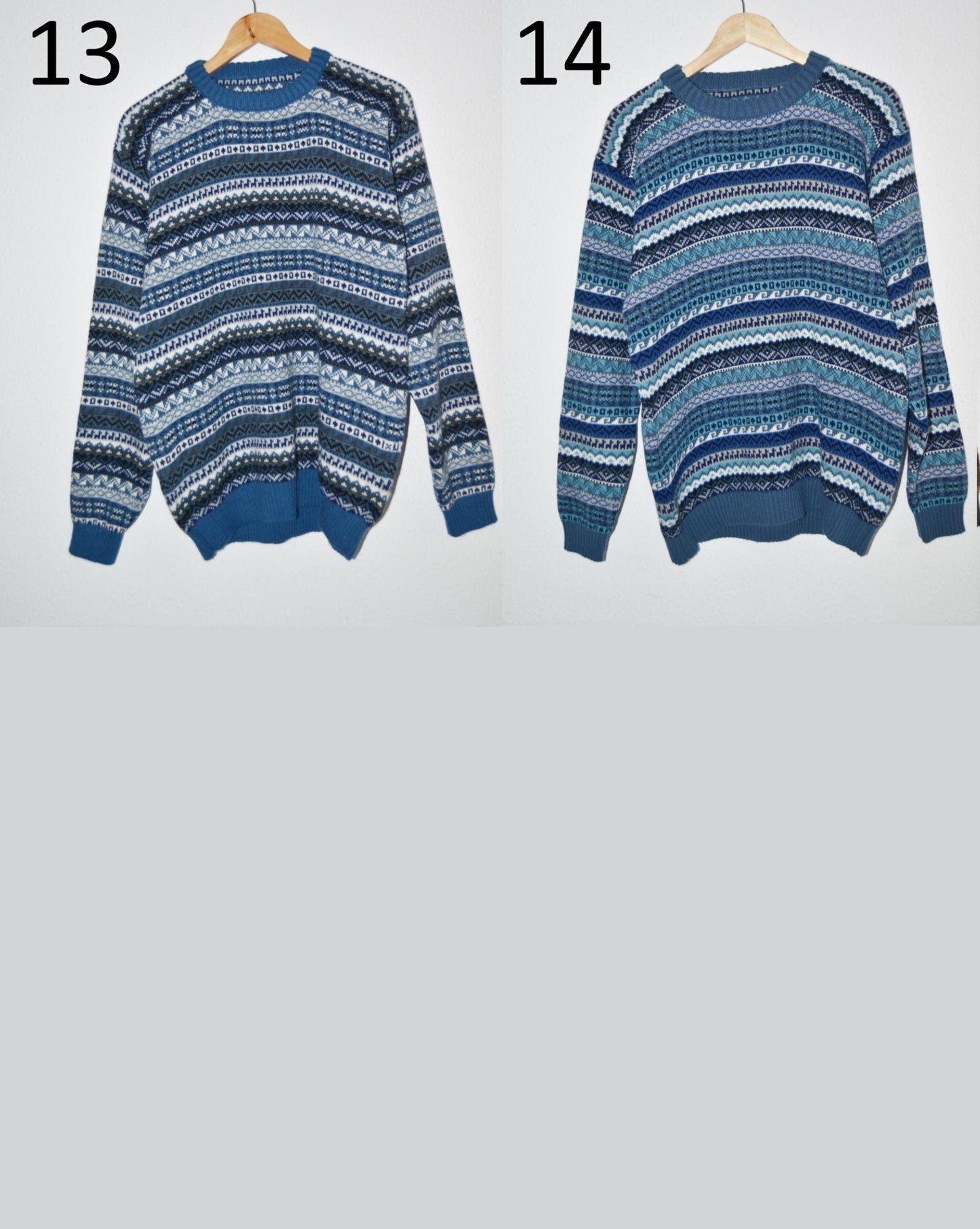 Two handmade alpaca wool sweaters in blue and white patterns hanging side by side with long sleeves and ribbed cuffs.