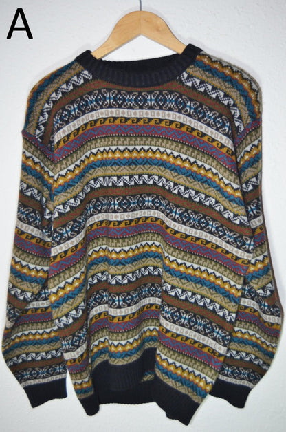 Handmade alpaca wool sweater with multicolor striped and geometric patterns on navy base.