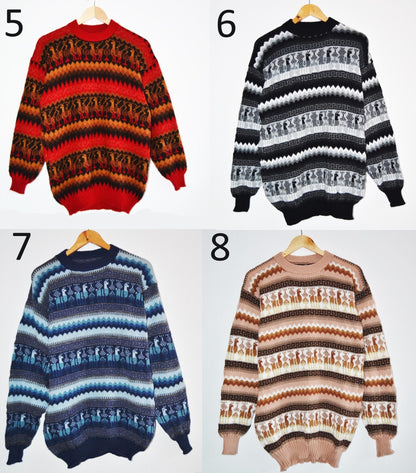 Handmade alpaca wool sweater in red with black and orange geometric patterns  .