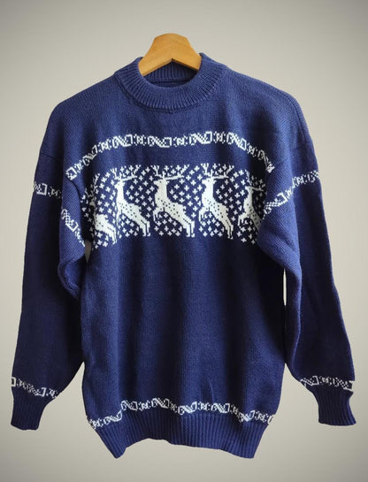 Handmade navy blue alpaca sweater with white geometric and animal pattern, crew neck and ribbed cuffs.